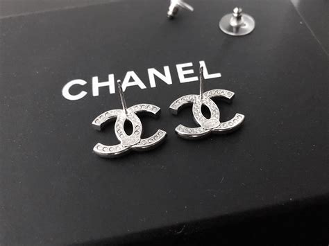 chanel vintage logo stud earrings|authentic Chanel logo stud earrings.